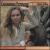 Hands in Wood von Cassandra Peterson